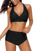 Angled shot of model wearing black halter ruched high-waist bikini set
