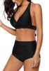 Model poses wearing black halter ruched high-waist bikini set