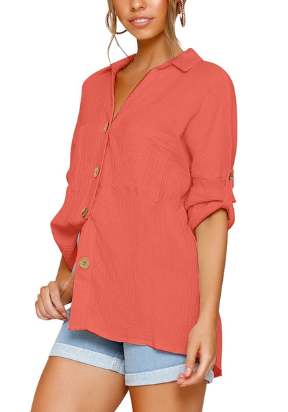 Side view of model in coral collared V-neckline cuffed sleeves button-up top