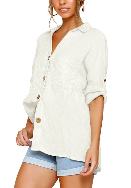 Side view of model in white collared V-neckline cuffed sleeves button-up top