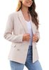Side view of model wearing light mauve notch lapel double-breasted blazer