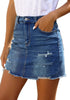Angled shot of model wearing dark blue distressed frayed hem denim mini skirt