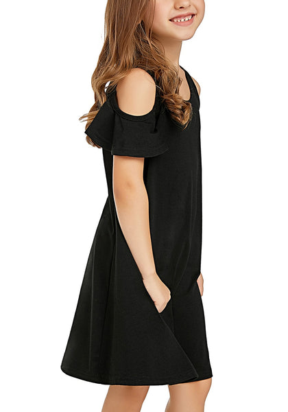 Right side view of little girl wearing black cold shoulder ruffled short sleeves girl tunic dress